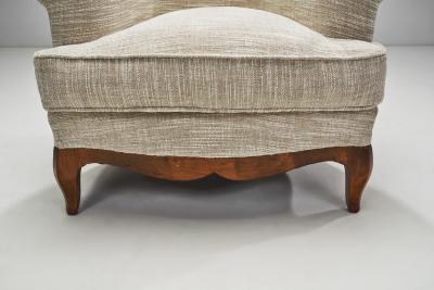 European Lounge Chairs with Sculpted Wooden Legs Europe ca 1950s