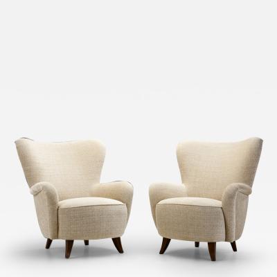 European Mid Century Modern Upholstered Lounge Chairs Europe ca 1950s