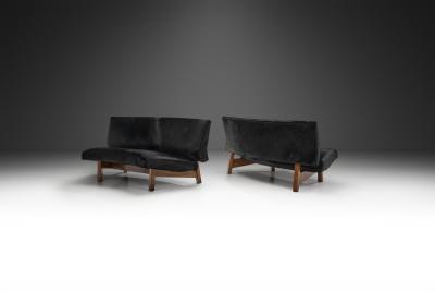 European Mid Century Two Part Sofa in Black Cow Hide Europe ca 1950s