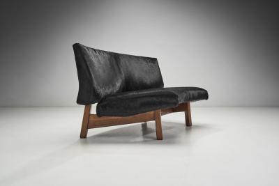 European Mid Century Two Part Sofa in Black Cow Hide Europe ca 1950s