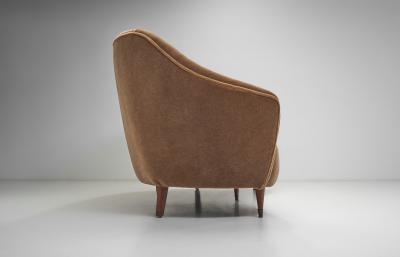 European Upholstered Three Seater Sofa with Stained Wood Legs Europe ca 1960s