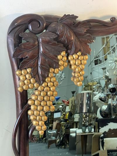 FANTASTICAL CARVED ART NOUVEAU MIRROR WITH GILT GRAPES AND BIRDS
