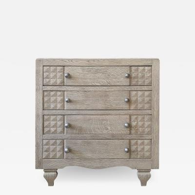 FOUR DRAWER DRESSER WITH SCULPTURAL FACADE