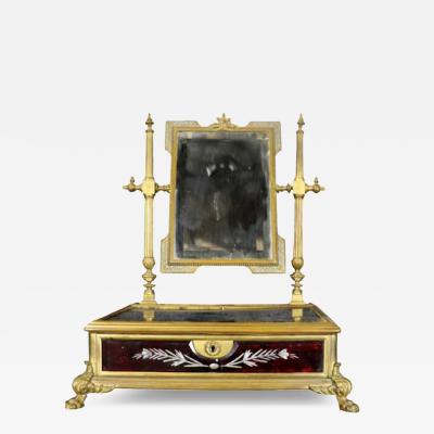 FRENCH EMPIRE BRONZE ENAMEL AND GLASS DRESSING MIRROR