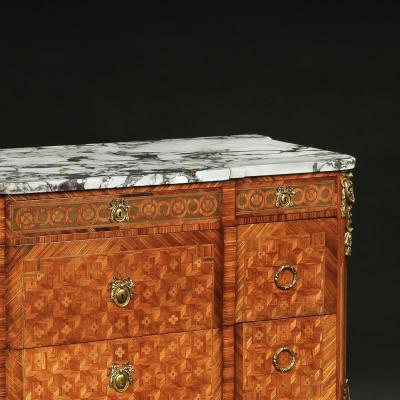 FRENCH GILT BRONZE MOUNTED TULIPWOOD AND KINGWOOD MARBLE TOPPED COMMODE