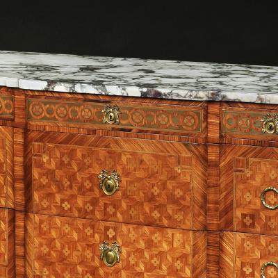 FRENCH GILT BRONZE MOUNTED TULIPWOOD AND KINGWOOD MARBLE TOPPED COMMODE