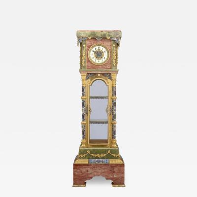 FRENCH MARBLE ONYX ENAMEL AND ORMOLU PEDESTAL CLOCK
