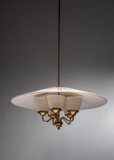Fabric and brass chandelier
