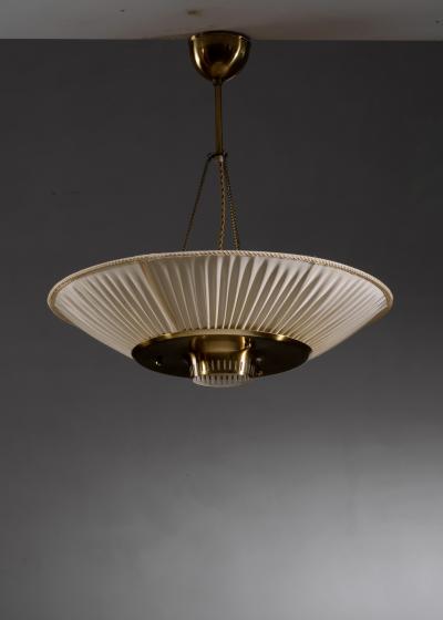 Fabric and brass pendant