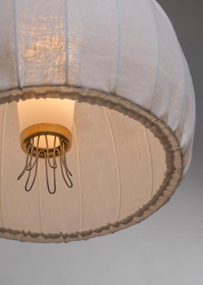 Fabric and glass pendant lamp