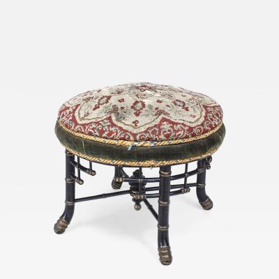 Faux bamboo ebonized and gilt trimmed round stool bench