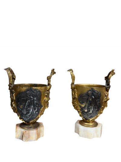 Ferdinand Barbedienne 19TH CENTURY PAIR OF FRENCH BRONZE NUDE SCENE URNS ON ONYX BASES