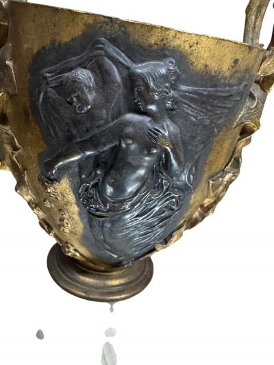 Ferdinand Barbedienne 19TH CENTURY PAIR OF FRENCH BRONZE NUDE SCENE URNS ON ONYX BASES