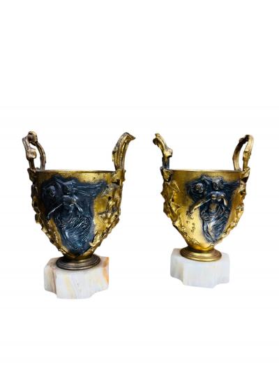 Ferdinand Barbedienne 19TH CENTURY PAIR OF FRENCH BRONZE NUDE SCENE URNS ON ONYX BASES