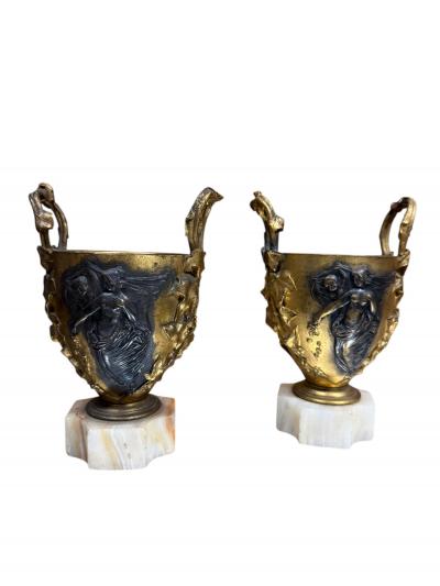 Ferdinand Barbedienne 19TH CENTURY PAIR OF FRENCH BRONZE NUDE SCENE URNS ON ONYX BASES