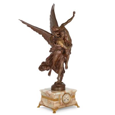 Ferdinand Barbedienne Antique patinated bronze and onyx mantel clock by Merci and Barbedienne