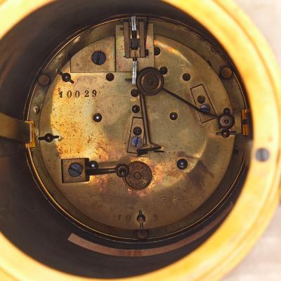 Ferdinand Barbedienne Antique patinated bronze and onyx mantel clock by Merci and Barbedienne