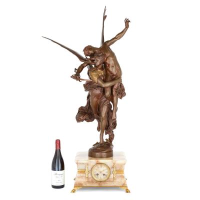 Ferdinand Barbedienne Antique patinated bronze and onyx mantel clock by Merci and Barbedienne
