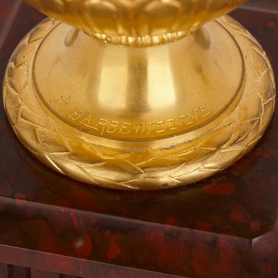 Ferdinand Barbedienne Pair of red marble and gilt bronze table candelabra by Barbedienne
