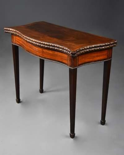 Fine 18thc serpentine mahogany card table of exceptional patina
