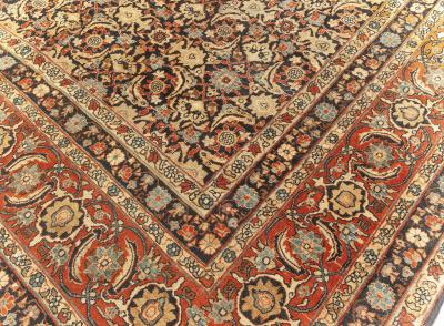 Fine Antique Kirman Rug in Black Red and Yellow