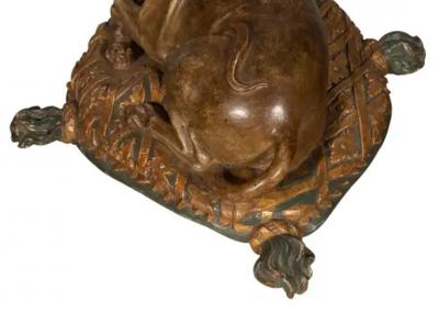Fine European Carved and Painted Dog Lying on a Pillow