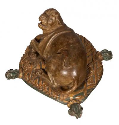 Fine European Carved and Painted Dog Lying on a Pillow