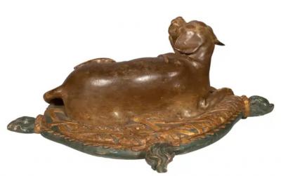 Fine European Carved and Painted Dog Lying on a Pillow