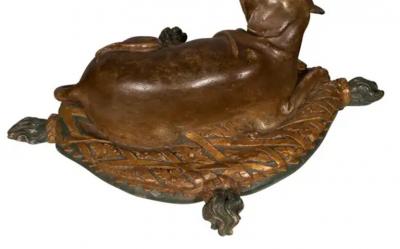 Fine European Carved and Painted Dog Lying on a Pillow