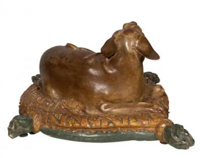 Fine European Carved and Painted Dog Lying on a Pillow