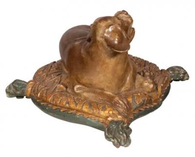 Fine European Carved and Painted Dog Lying on a Pillow