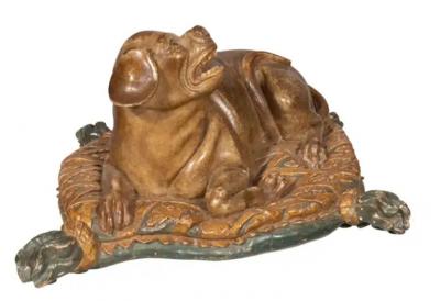 Fine European Carved and Painted Dog Lying on a Pillow