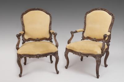 Fine Pair of Carved Walnut Armchairs with Rocaille Ribbons and Flower Motifs