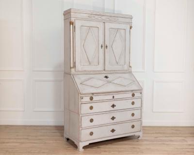 Fine Swedish three part bureau with charming carvings and marble painted columns