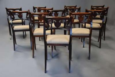 Fine quality set of thirteen Regency simulated rosewood dining chairs