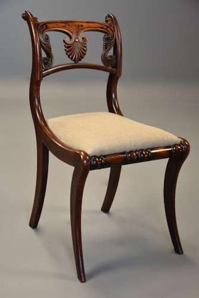 Fine quality set of thirteen Regency simulated rosewood dining chairs