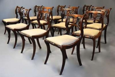 Fine quality set of thirteen Regency simulated rosewood dining chairs
