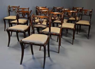 Fine quality set of thirteen Regency simulated rosewood dining chairs