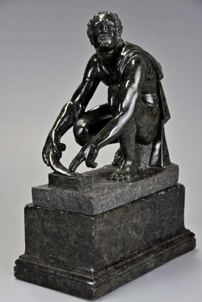 Finely carved 19th century serpentine figure of Arrotino 