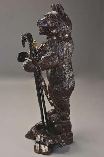 Finely carved late 19th century Black Forest hall stand of a bear