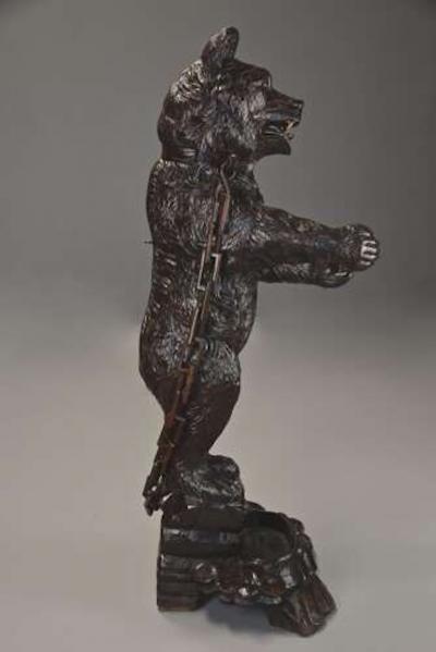 Finely carved late 19th century Black Forest hall stand of a bear