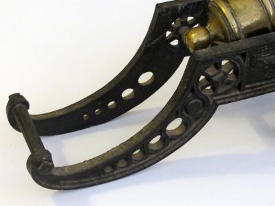 Finely rendered English Victorian brass ornamental cannon on cast iron carriage