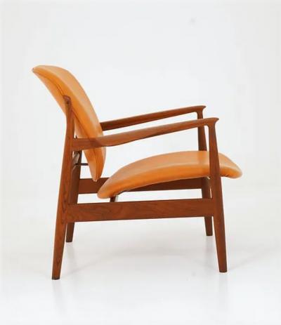 Finn Juhl Finn Juhl Cognac Leather and Teak Lounge Chair model FD 136