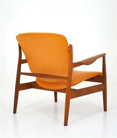Finn Juhl Finn Juhl Cognac Leather and Teak Lounge Chair model FD 136