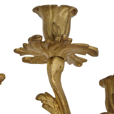 Five antique Louis XV style gilt bronze wall sconces