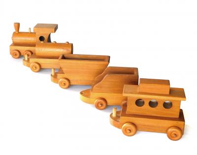 Five piece wooden train set attributed to Montgomery Schoolhouse Vermont
