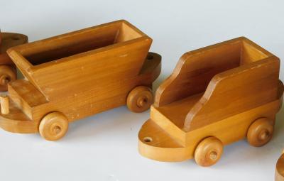 Five piece wooden train set attributed to Montgomery Schoolhouse Vermont