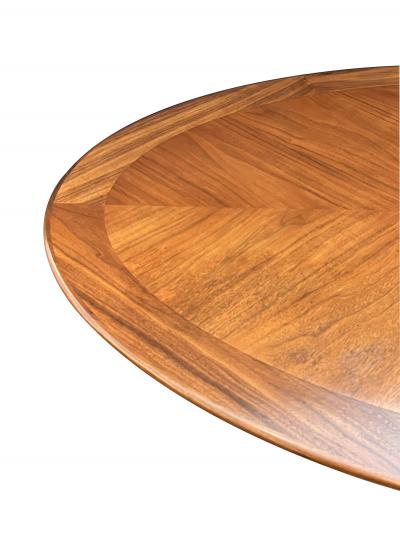 Florence Knoll A Florence Knoll Walnut and Chrome Oval Dining Table by G M Proctor Sons