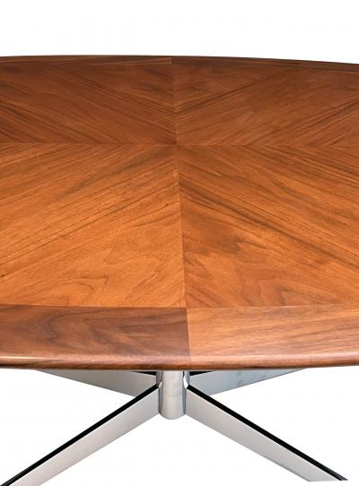 Florence Knoll A Florence Knoll Walnut and Chrome Oval Dining Table by G M Proctor Sons