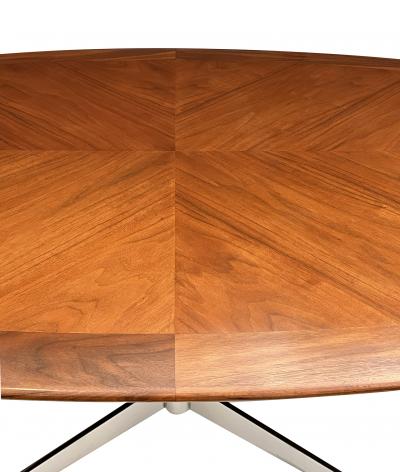 Florence Knoll A Florence Knoll Walnut and Chrome Oval Dining Table by G M Proctor Sons